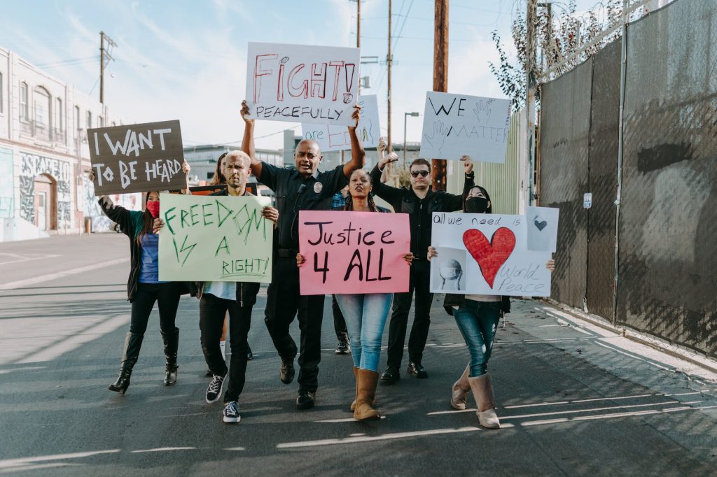 group of people holding placards